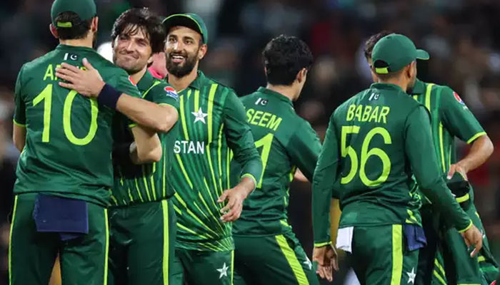 Pakistan players congratulate each other after a win in T20 World Cup match. — AFP/File