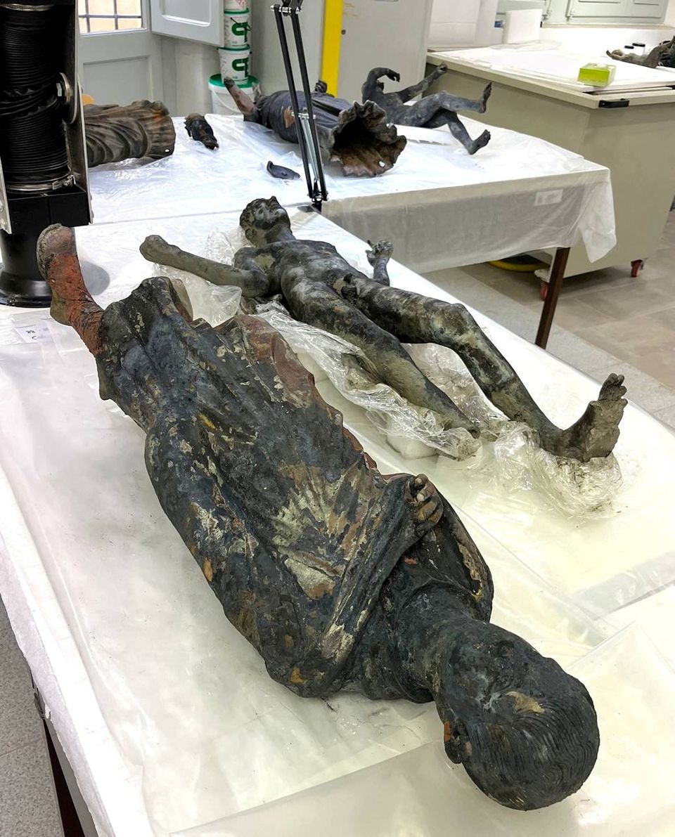 Newly discovered 2,300-year-old bronze statues are displayed at a laboratory in Grosseto, Italy, in this handout photo obtained by Reuters on November 8, 2022.— Ministero della Cultura/Handout via Reuters