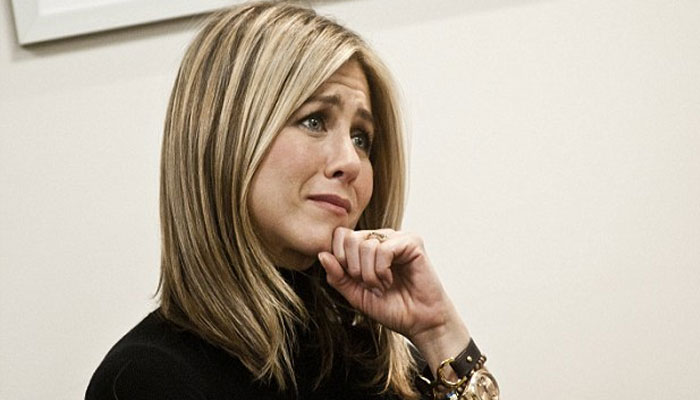 Jennifer Aniston bares it all in TINY Chanel bra while discussing  infertility struggle