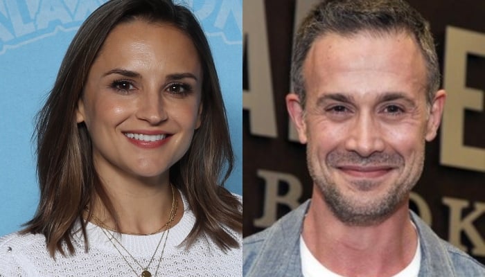 Freddie Prinze Jr and Rachael Leigh Cook seen arm in arm at a movie premiere