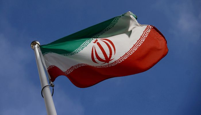 The Iranian flag waves in front of the International Atomic Energy Agency (IAEA) headquarters in Vienna, Austria, March 1, 2021.— Reuters