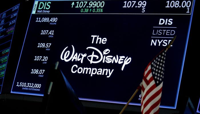 A screen shows the logo and a ticker symbol for The Walt Disney Company on the floor of the New York Stock Exchange (NYSE) in New York, US, December 14, 2017. — Reuters/File