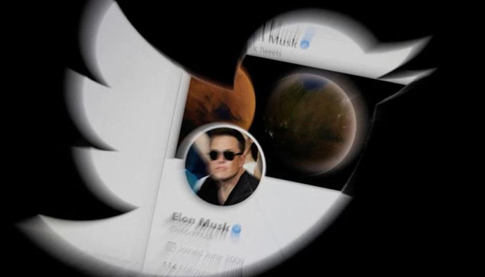 Elon Musk twitter account is seen through Twitter logo in this illustration taken, April 25, 2022. — Reuters/File