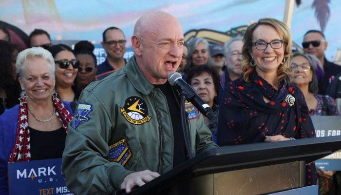 US Senator Mark Kelly (D-AZ) and his wife Gabby Giffords, a former member of the United States House of Representatives, declares victory in his re-election campaign against Republican challenger Blake Masters the U.S. midterm elections in Phoenix, Arizona, U.S., November 12, 2022.— Reuters