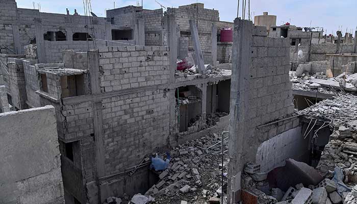 Damaged buildings are shown after what Syrian authorities said was an Israeli air strike in the western suburbs of Damascus, Syria in this handout released by state news agency SANA on April 27, 2020. — Reuters/File