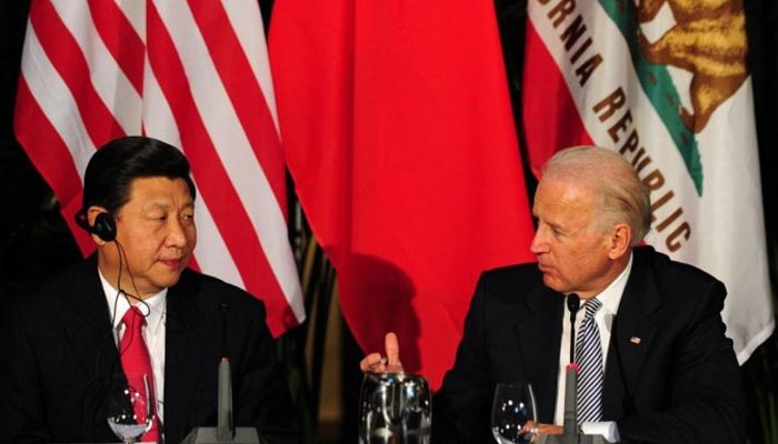 Chinese leader Xi Jinping (L) and US President Joe Biden. — AFP