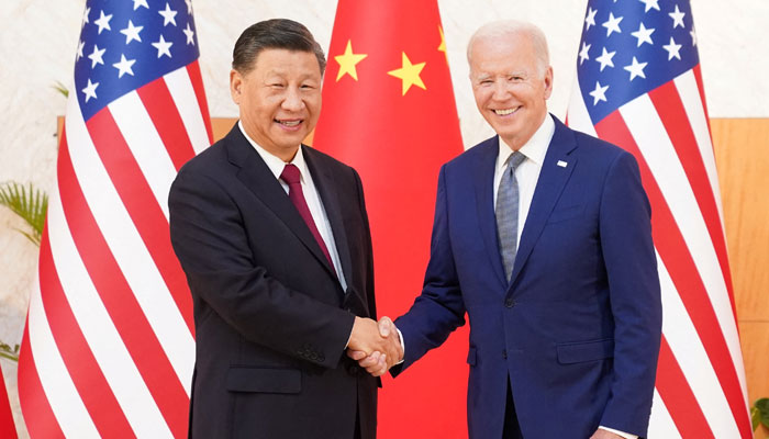 US President Joe Biden shakes hands with Chinese President Xi Jinping as they meet on sidelines of G20 leaders summit in Bali, Indonesia, November 14, 2022. — Reuters