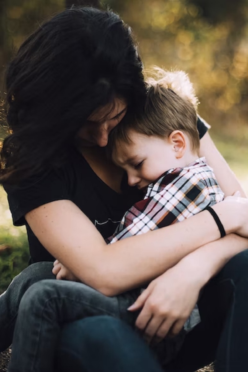 A mother hugging her child.— Unsplash