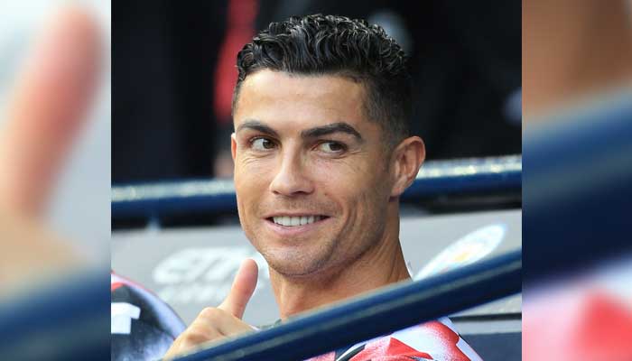 In this file photo taken on October 2, 2022 Manchester Uniteds Portuguese striker Cristiano Ronaldo sits on the bench during the English Premier League football match between Manchester City and Manchester United at the Etihad Stadium in Manchester, northwest England. — AFP