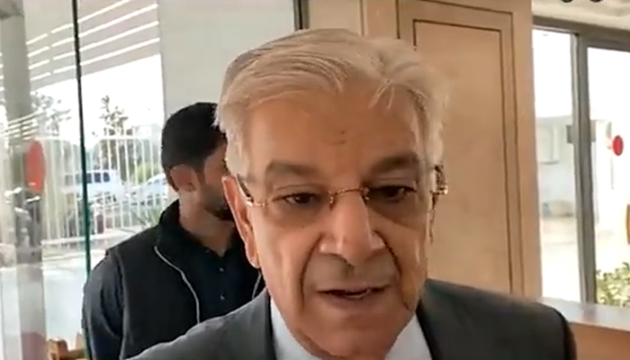 Minister for Defence Khawaja Asif speaks to journalists outside the parliament in Islamabad on November 16, 2022. — Twitter