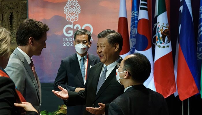 Canadas Prime Minister Justin Trudeau speaks with Chinas President Xi Jinping at the G20 Leaders Summit in Bali, Indonesia, November 16, 2022. — Reuters