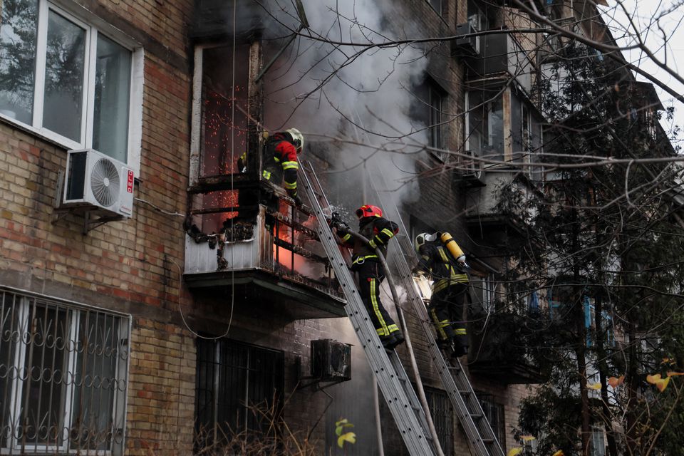 Firefighters work to put out a fire in a residential building hit by a Russian missile strike, amid Russias attack on Ukraine, in Kyiv, Ukraine November 15, 2022.— Reuters