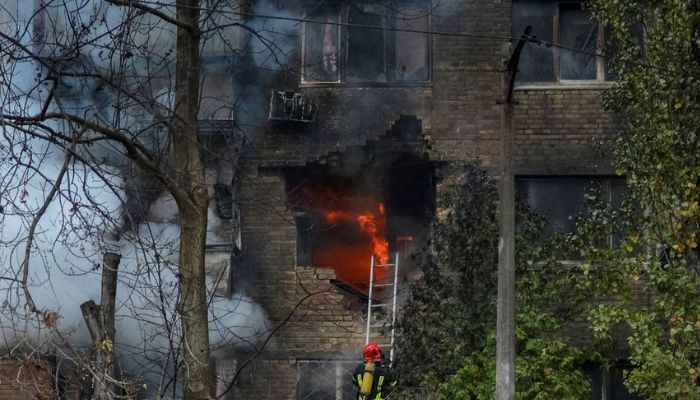 Firefighters work to put out a fire in a residential building hit by a Russian missile strike, amid Russias attack on Ukraine, in Kyiv, Ukraine November 15, 2022.— Reuters