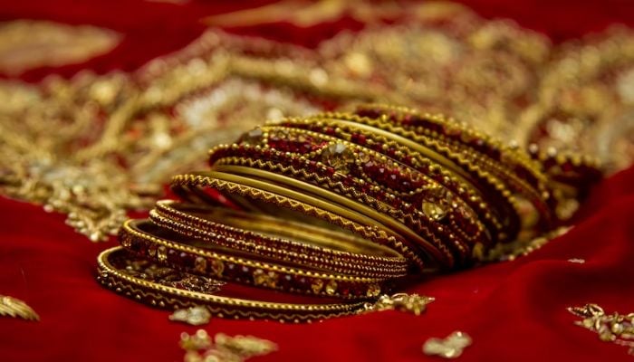 A set of bangles for a bride.— Unsplash