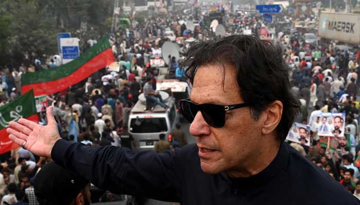 In this photograph taken on November 1, 2022, Pakistans former prime minister Imran Khan speaks while taking part in an anti-government march in Gujranwala. — AFP