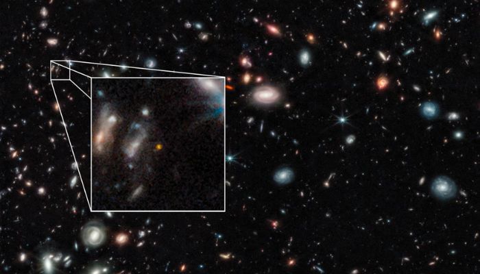 This handout image from NASA´s James Webb Space Telescope Near-Infrared Camera (NIRCam) released by NASA and STScl on November 17, 2022, shows one of two farthest galaxies seen to date of the outer regions of the giant galaxy cluster Abell 2744.— AFP