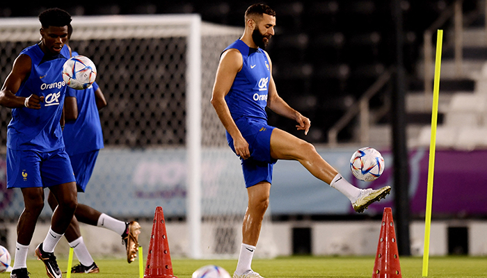 Soccer Football - FIFA World Cup Qatar 2022 - France Training - Al Sadd SC Stadium, Doha, Qatar - November 19, 2022 Frances Karim Benzema and Aurelien Tchouameni during training. — Reuters