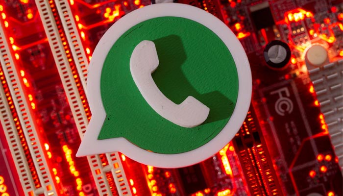 A 3D printed Whatsapp logo is placed on a computer motherboard in this illustration taken Jan. 21, 2021. — Reuters