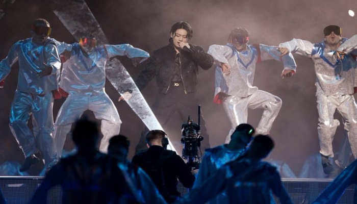 Jungkook wins the crowd as he performs on Dreamers at FIFA Worldcup Opening Ceremony