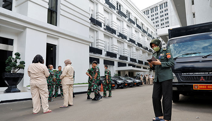People gather outside Indonesias Defense Ministry buildings following an earthquake in Jakarta, Indonesia, November 21, 2022. — Reuters