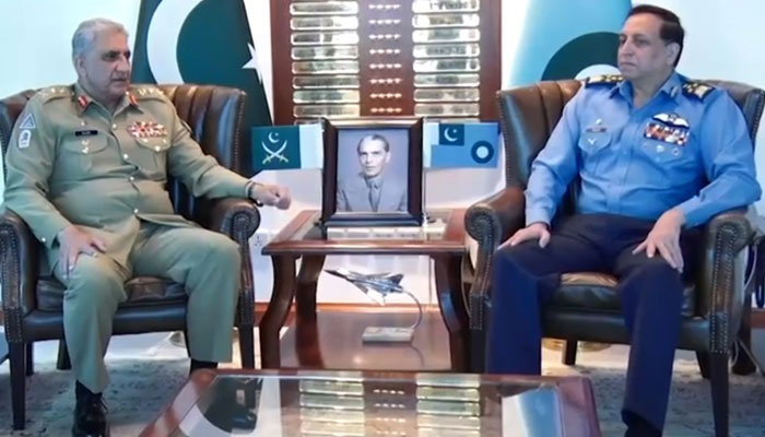 Chief of Army Staff General Qamar Javed Bajwa discusses matters of professional interest with Chief of the Air Staff, Air Chief Marshal Zaheer Ahmed Baber Sidhu, during a farewell visit to the Air Headquarters.  — Screengrab of a video released by ISPR