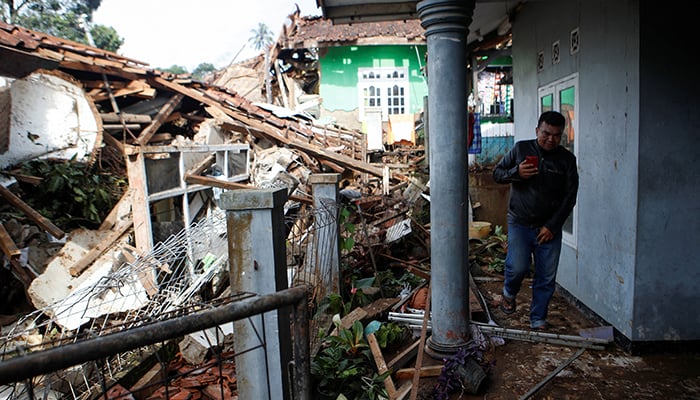 A man inspects his house that got destroyed in the earthquake, in Cugenang, Cianjur, West Java province, Indonesia, November 22, 2022. — Reuters
