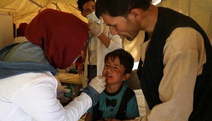 A child receives medical treatment for measles in Kabul, Afghanistan in August 10, 2021. — Reuters