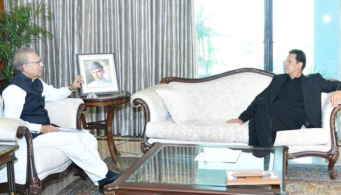 (L to R) President Arif Alvi and PTI Chairman Imran Khan. — Facebook/File