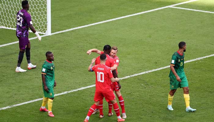 2022 Switzerlands Breel Embolo celebrates scoring their first goal with Silvan Widmer and Granit Xhaka. — Reuters