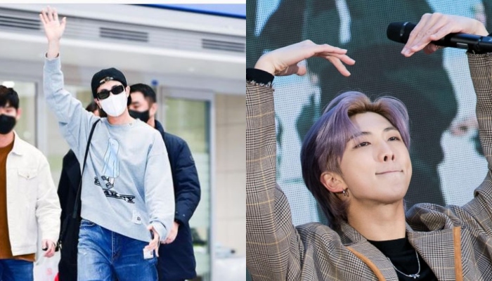 RM waves at fans as he arrives at Incheon International Airport