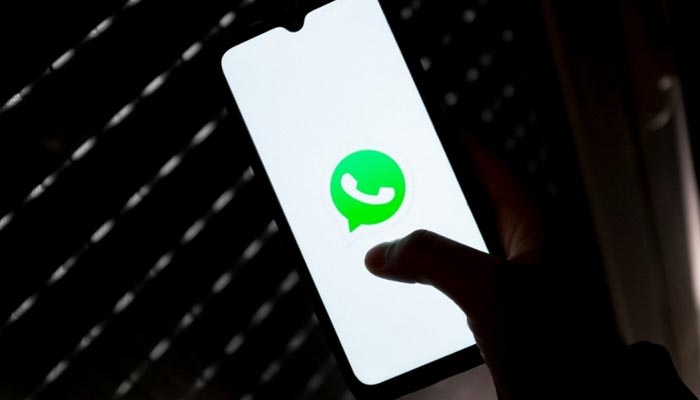 The picture shows WhatsApp logo on a mobile phone. — AFP/File