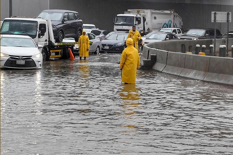 Two dead as Saudi storm closes schools, cuts main road to Makkah 8 Vehicles drive through a flooded street following heavy rain, in Jeddah, Saudi Arabia, November 24, 2022. — Reuters
