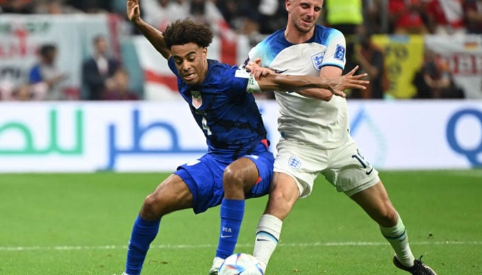 USAs Tyler Adams (L) fights for the ball with Englands Mason Mount Patrick. AFP