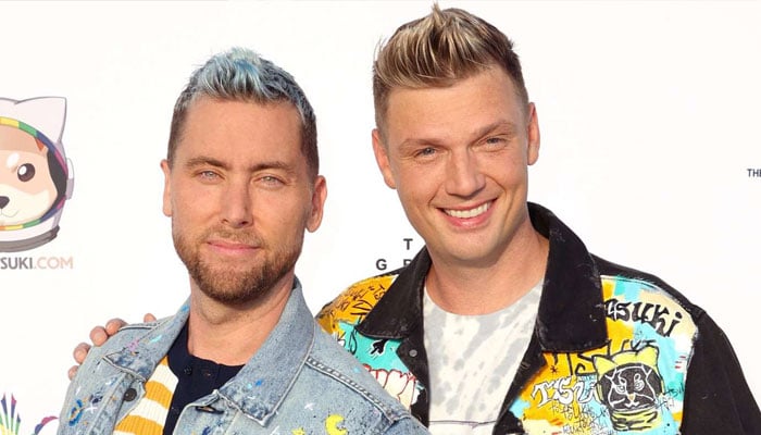 Lance Bass gives a cheeky nod to an iconic 90s style with Nick Carter