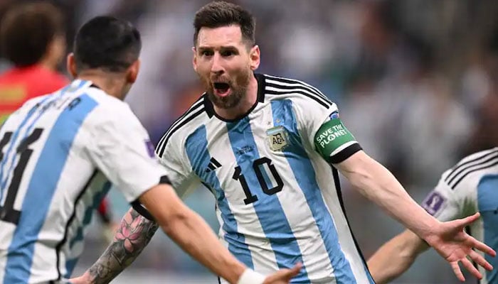 Lionel Messi celebrates after scoring the opener in a FIFA match against Mexico. AFP