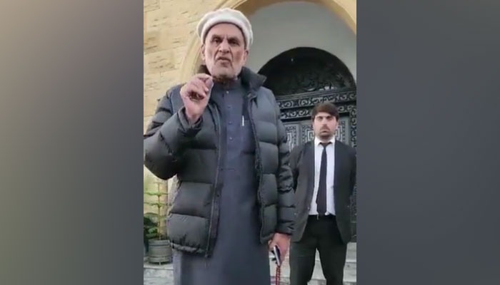 Screengrab taken from PTI leader Azam Swatis video recorded during his arrest. — Twitter