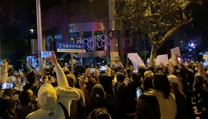People take part in a protest against coronavirus disease (COVID-19) curbs in Shanghai, China, November 27, 2022, in this screen grab obtained from a social media video. — Reuters