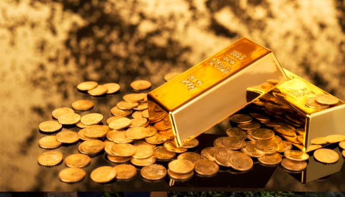 An undated image of gold bars and coins. — Reuters/File