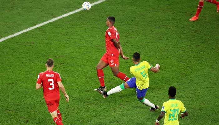 [1/4] Soccer Football - FIFA World Cup Qatar 2022 - Group G - Brazil v Switzerland - Stadium 974, Doha, Qatar - November 28, 2022 Brazils Casemiro scores their first goal. — Reuters.