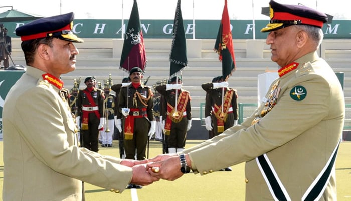 General Qamar Javed Bajwa (right) hands over the baton of command to Gen Asim Munir during a ceremony at the General Headquarters in Rawalpindi, on November 29, 2022. — RadioPakistan