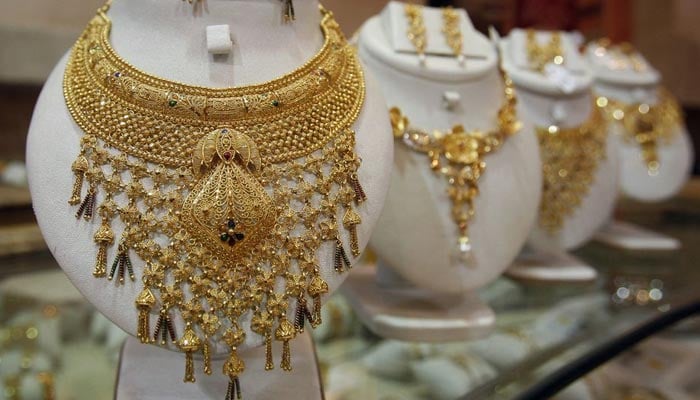 An undated image of gold jewellery sets displayed in a shop. — Reuters/File
