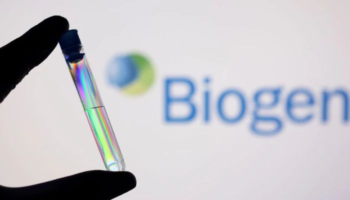 A test tube is seen in front of displayed Biogen logo in this illustration taken, December 1, 2021.— Reuters