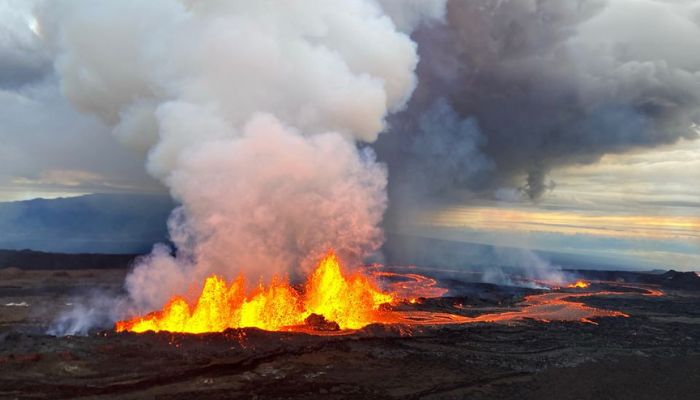 Aerial view of fissure 3 fountains of lava erupting on the Northeast Rift Zone summit of Mauna Loa volcano in Hawaii, U.S. November 29, 2022.- Reuters
