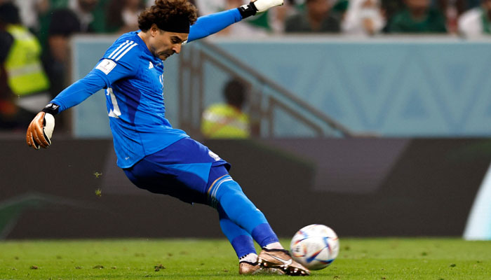 Mexicos goalkeeper Guillermo Ochoa kicks the ball during the Qatar 2022 World Cup Group C football match between Saudi Arabia and Mexico at the Lusail Stadium in Lusail, north of Doha on November 30, 2022. AFP