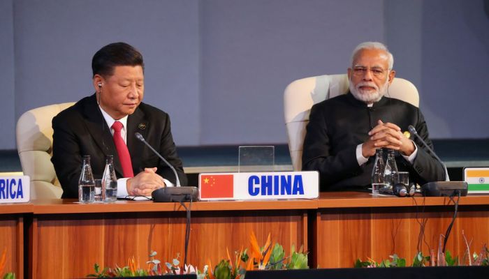 Indian Prime Minister Narendra Modi and China's President Xi Jinping attend the BRICS summit meeting in Johannesburg, South Africa, July 27, 2018.— Reuters