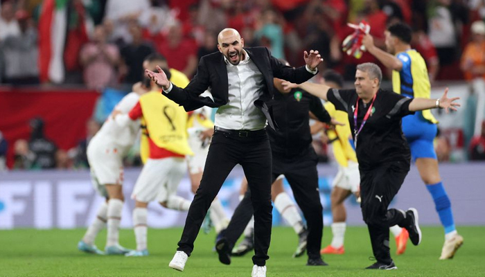 Soccer Football - FIFA World Cup Qatar 2022 - Group F - Canada v Morocco - Al Thumama Stadium, Doha, Qatar - December 1, 2022 Morocco coach Walid Regragui celebrates after the match as Morocco qualify for the knockout stages. — Reuters