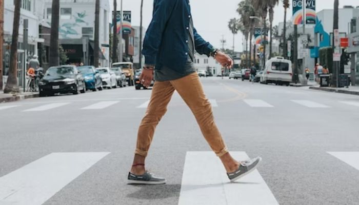 A person walks on the road.— Unsplash