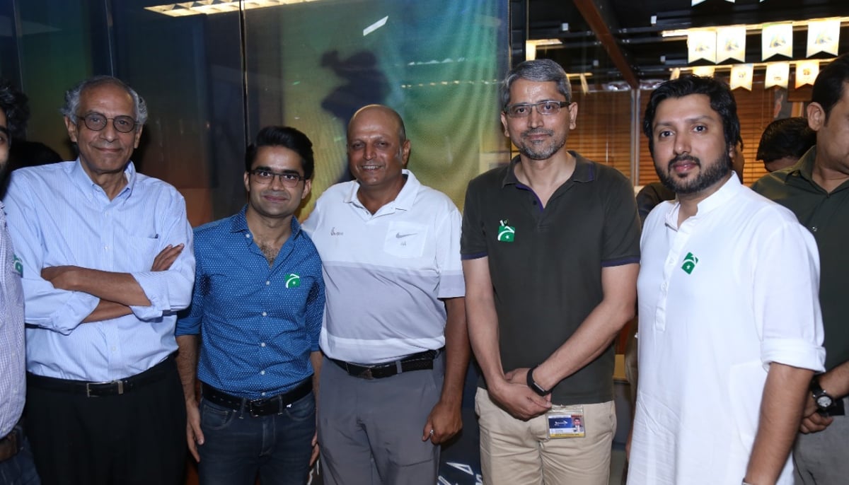 President of Geo and Jang Group Imran Aslam (left) poses along with Geo News anchorpersons Shahzeb Khanzada (second left), and Geo News Managing Director Azhar Abbas.