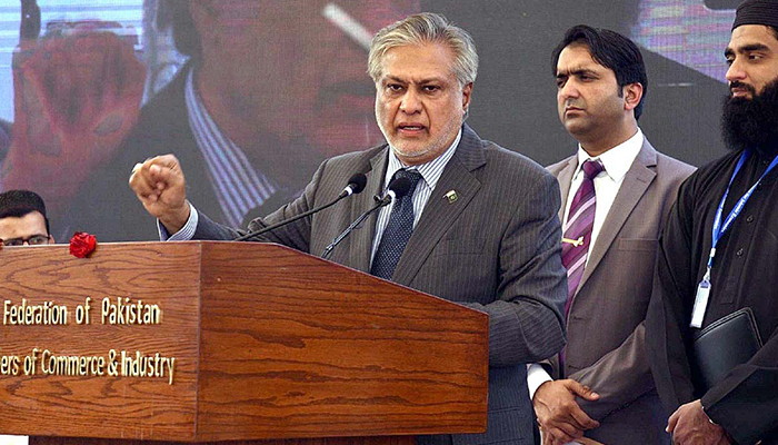 Federal Minister on Finance and Revenue Senator Mohammad Ishaq Dar addressing the Hurmat e Sood Conference at FPCCI in Karachi on November 30, 2022. — APP