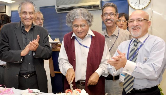 President of Geo and Jang Group Imran Aslam (left) claps along with other journalists, including Ghazi Salahuddin (centre), late editor The News Talat Aslam (second right), and Jang Groups Managing Director Shahrukh Hassan (right).